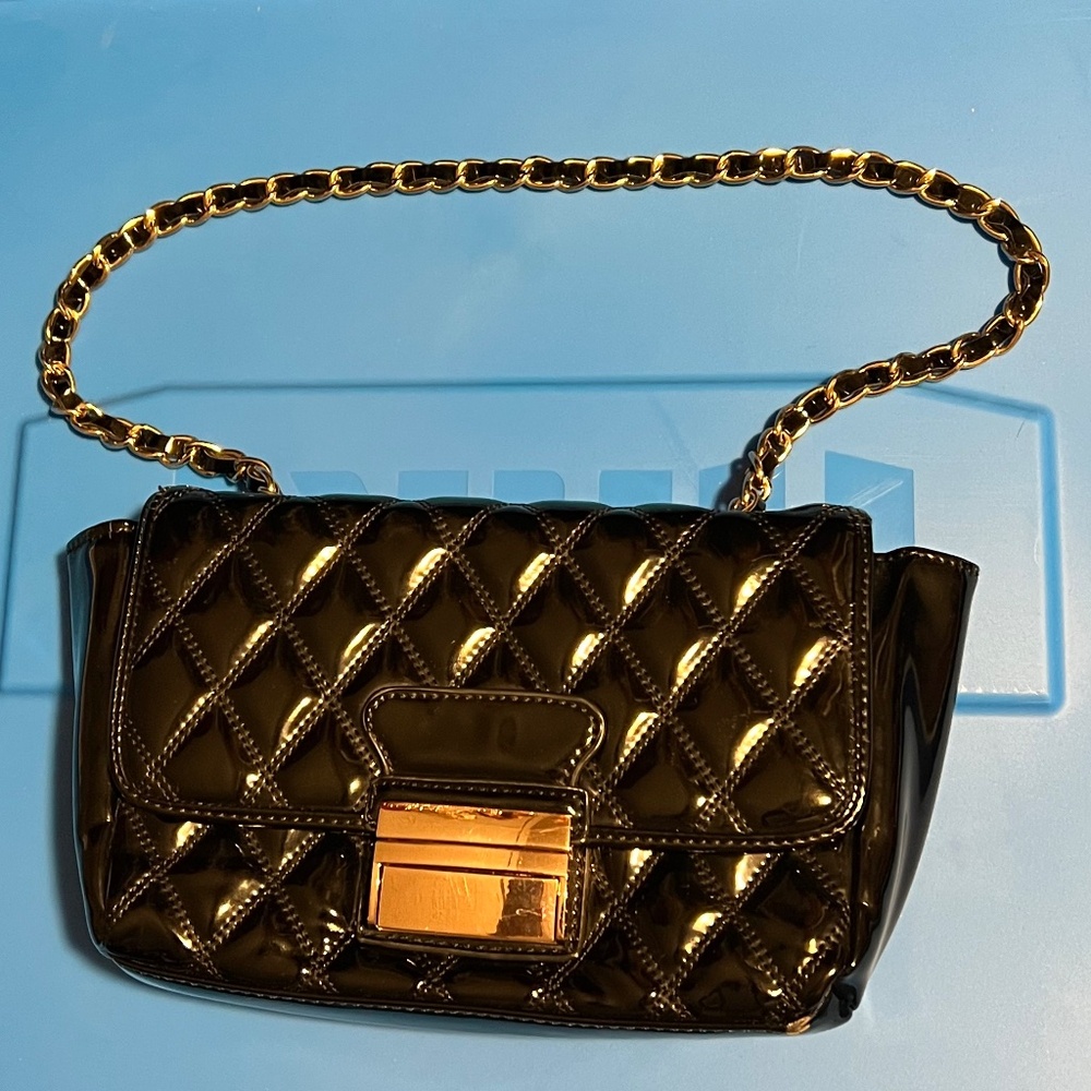 Black quilted vegan patent leather shoulder bag